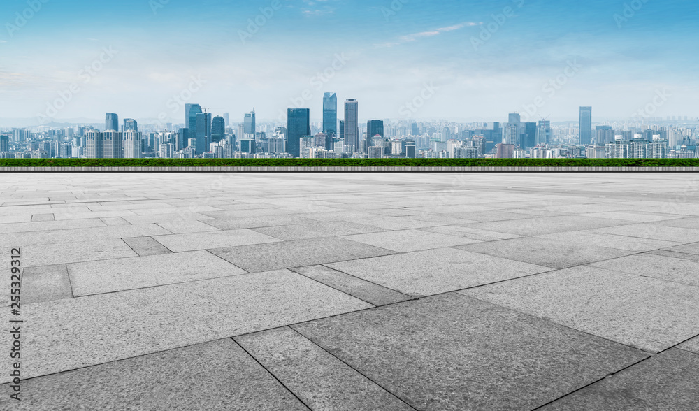 Urban skyscrapers with empty square floor tiles