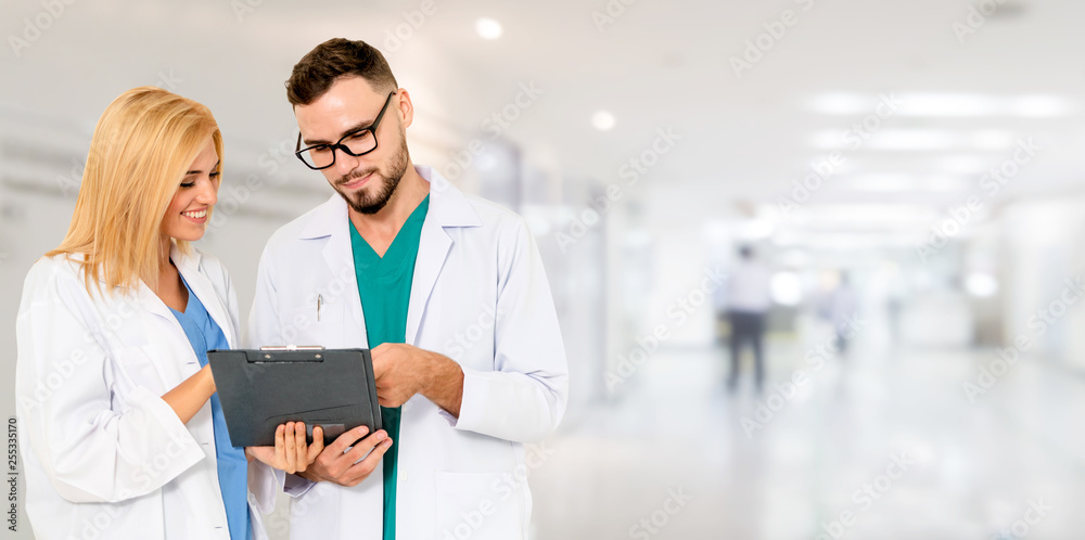 Doctor working with another doctor in the hospital. Healthcare and medical service.