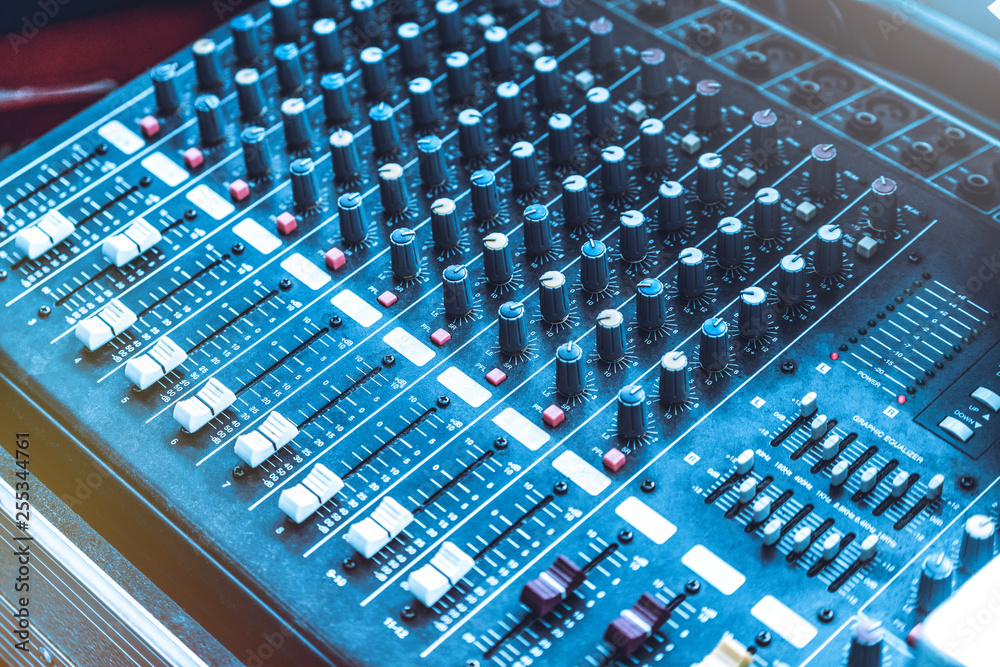 Amplifier mixer and equalizer in studio room in close up view.