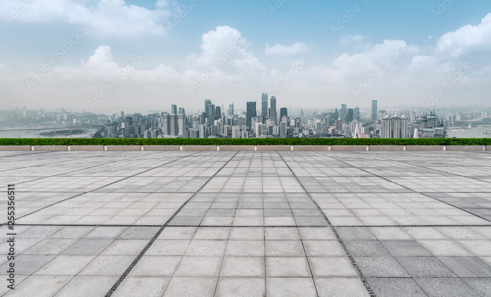 Urban skyscrapers with empty square floor tiles