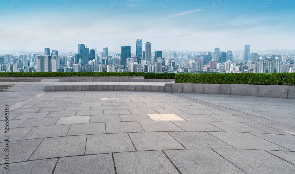 Urban skyscrapers with empty square floor tiles