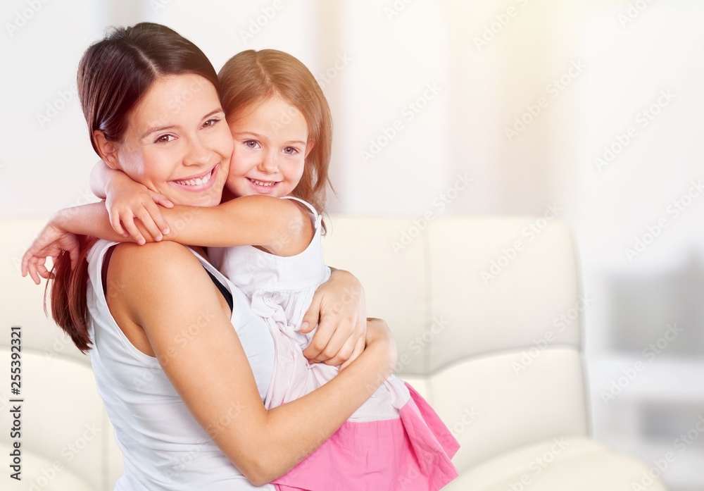 Happy Mother and daughter hugging