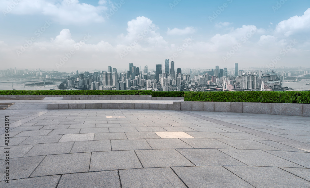 Urban skyscrapers with empty square floor tiles