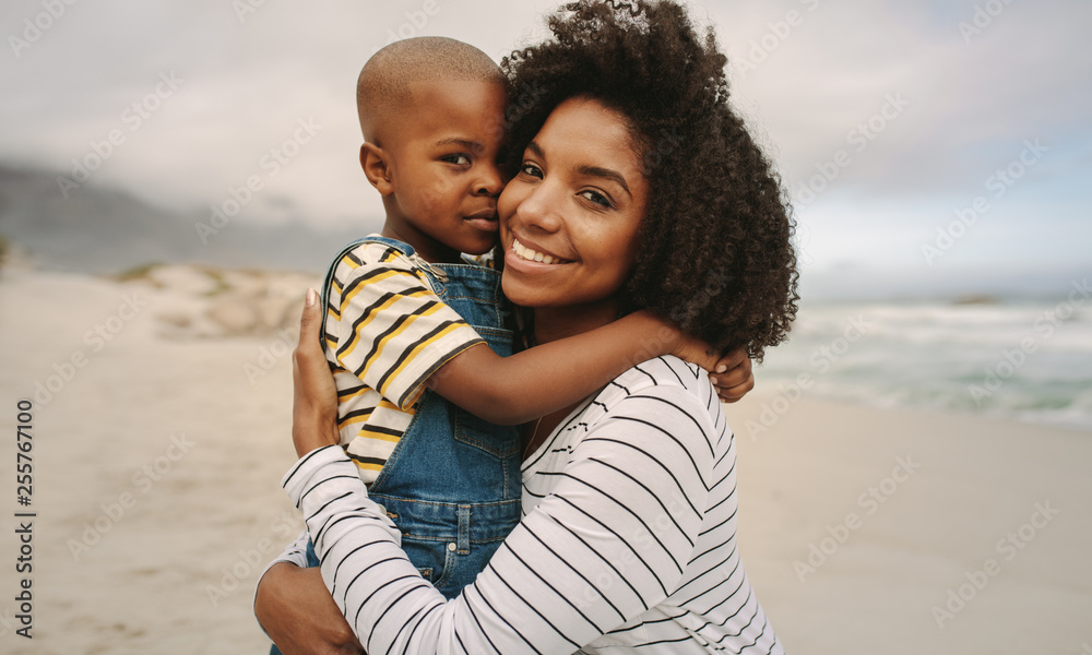 Mother with his son at the beach