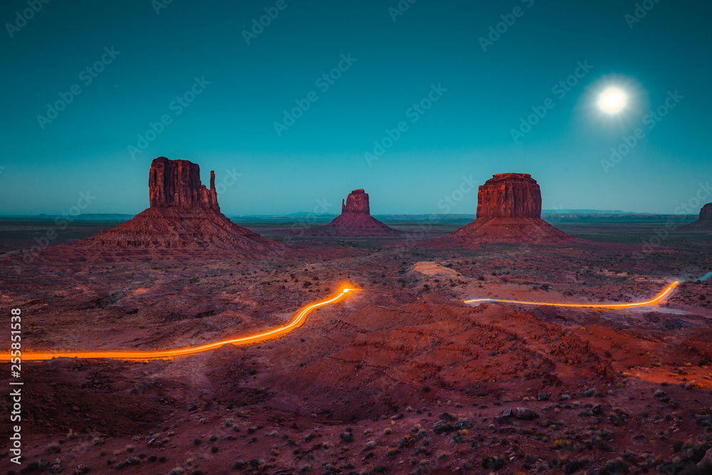 Monument Valley with light trails at night, Arizona, USA