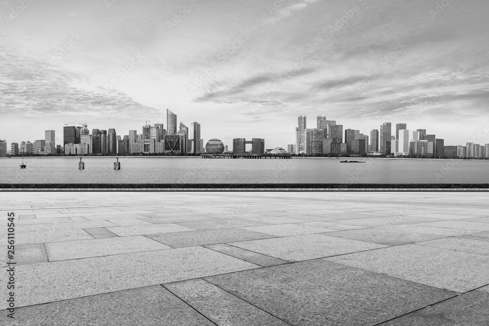 Urban skyscrapers with empty square floor tiles