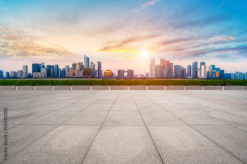 Urban skyscrapers with empty square floor tiles