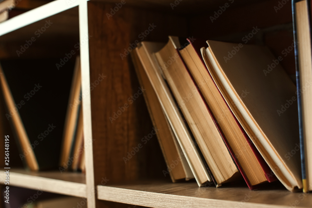 Books on shelf in library