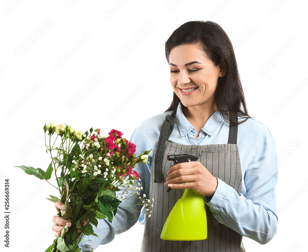 Beautiful female florist with bouquet of flowers on white background