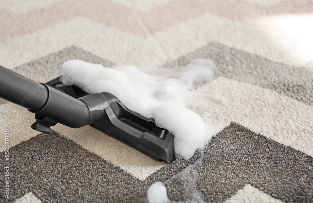 Washing of carpet with vacuum cleaner