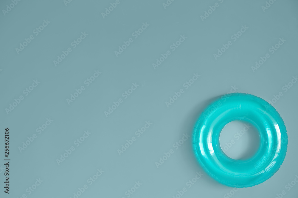 Inflatable ring on color background