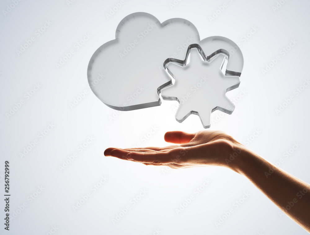 Cloud computing concept with glass symbol shown in hand