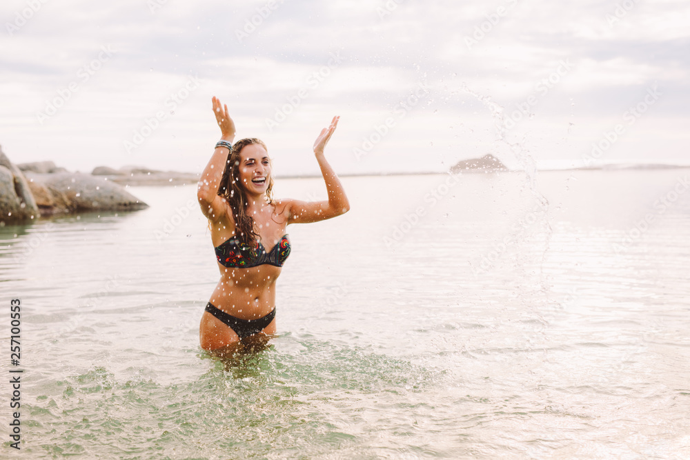 Woman enjoying in the sea water