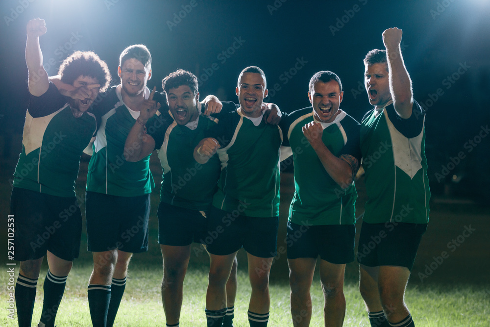 Professional rugby players celebrates a victory