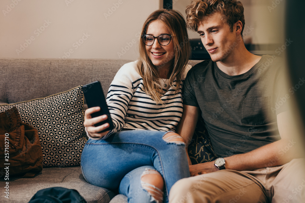 Two college students taking selfie