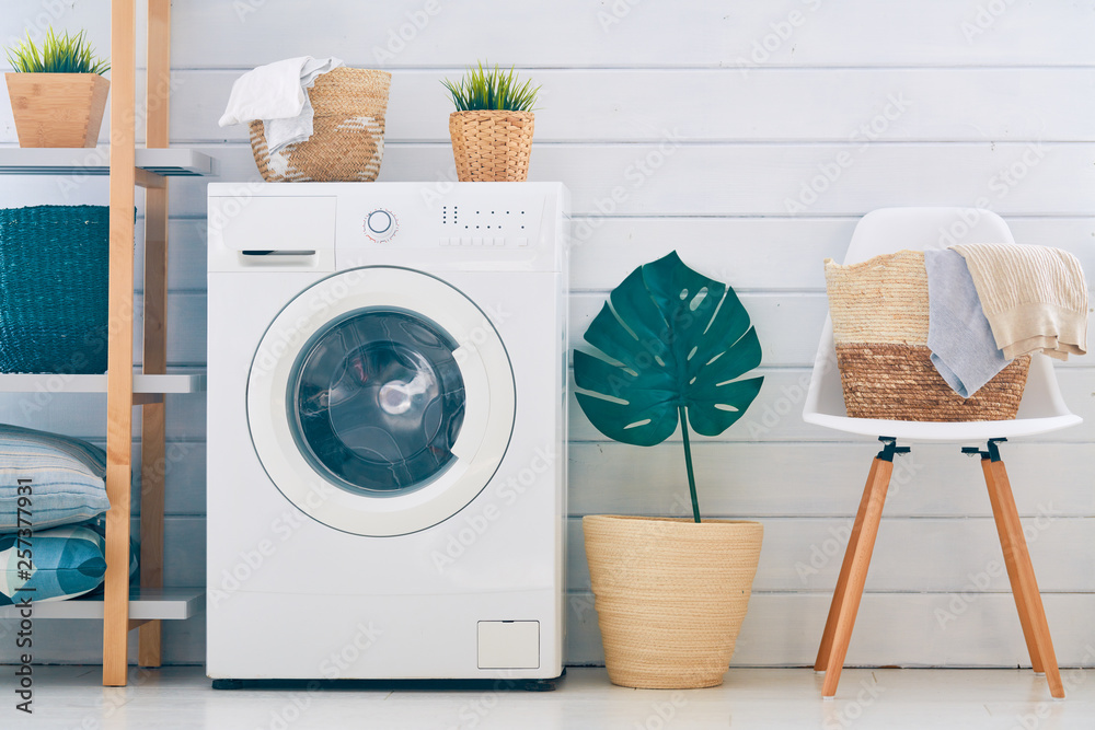 laundry room with a washing machine