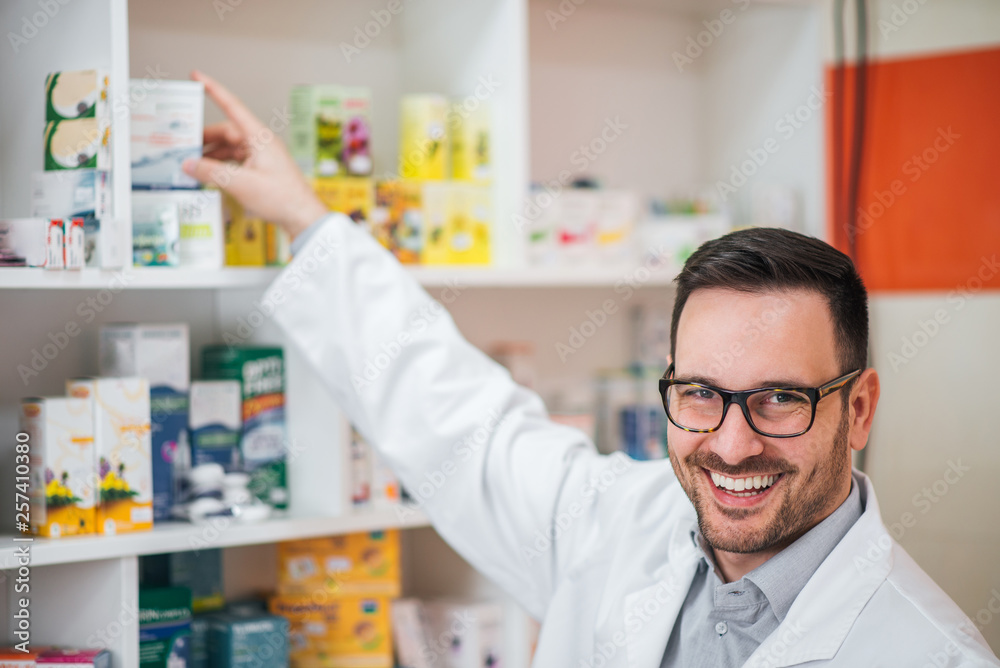 Smiling pharmacist at work, close-up.