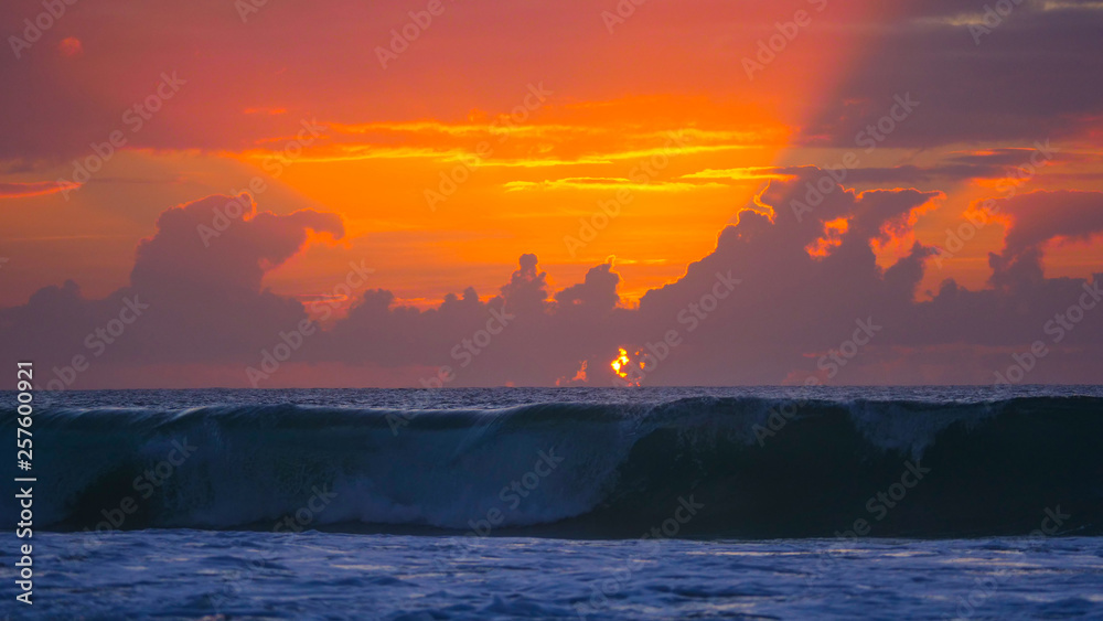 Perfect tube wave rolling towards the empty shore in the scenic Canary Islands.