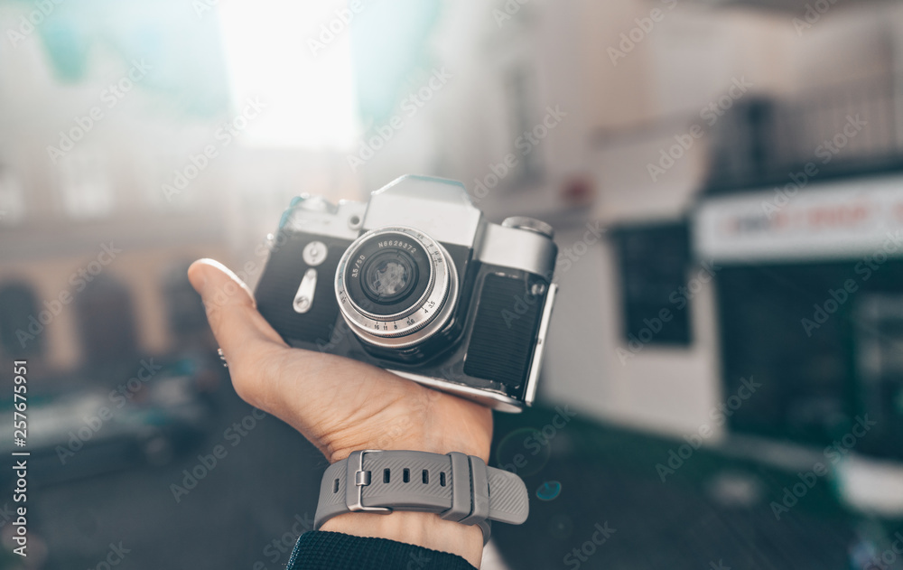 Mens hands with a camera close-up