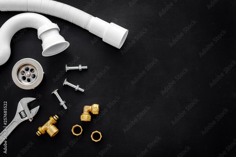 Plumber work with instruments, tools and gear on black background top view mock-up