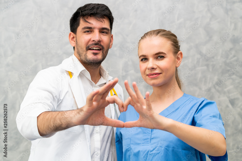 Doctor and nurse working in hospital. Healthcare and medical staff service concept.