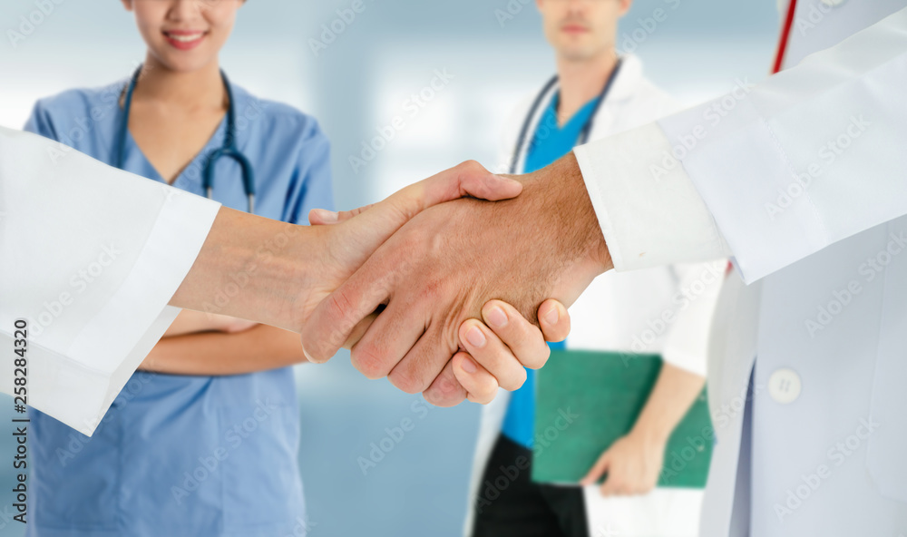 Healthcare people group. Professional doctor working in hospital office or clinic with other doctors