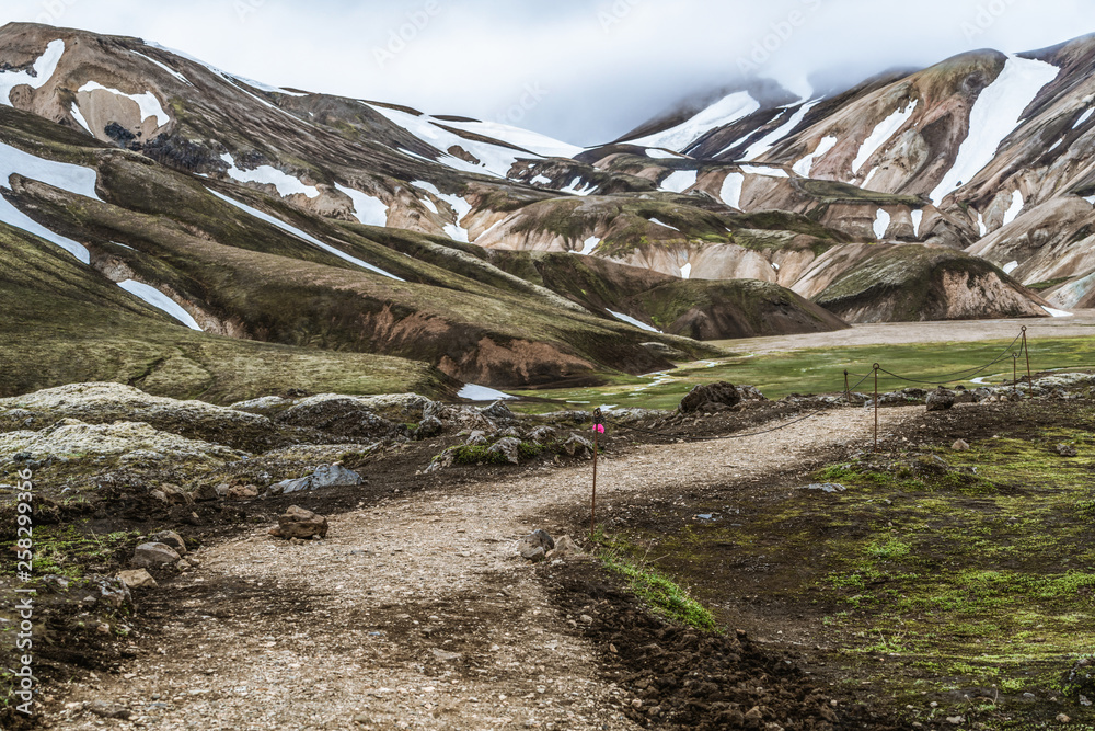 Beautiful Landmanalaugar gravel dust road way on highland of Iceland, Europe. Muddy tough terrain fo