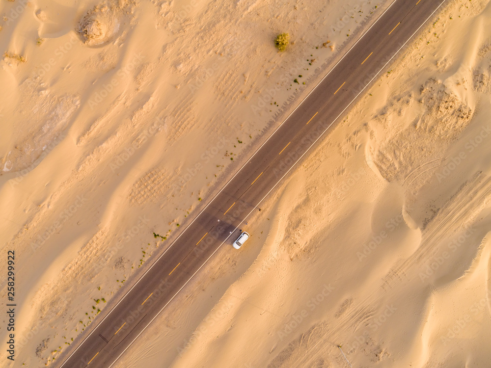 aerial view of highway on the gobi desert xinjiang， 