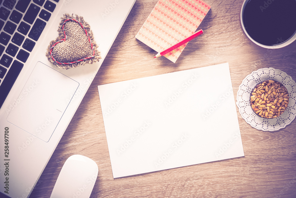 Blank notepad on wooden table