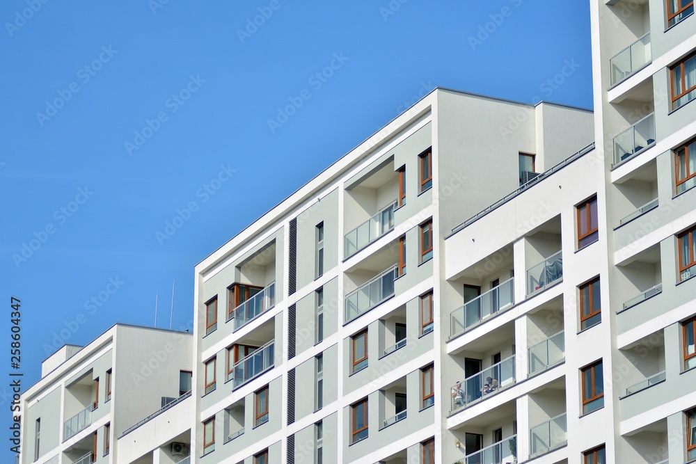 Fragment of a modern apartment building in front. Very modern apartment house.