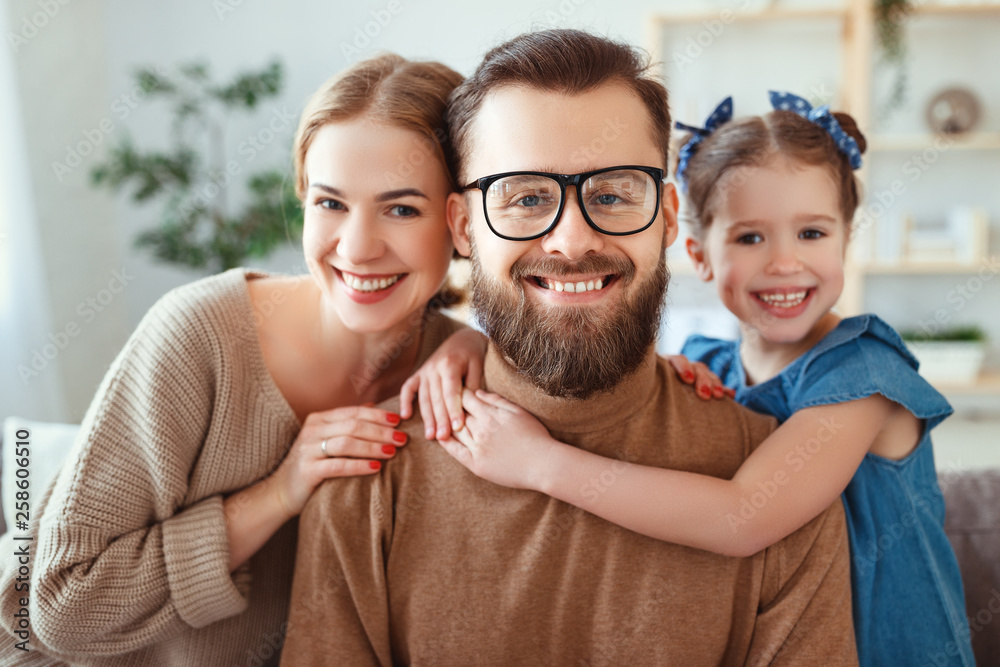 cheerful happy family mother father and child take selfies, take pictures.