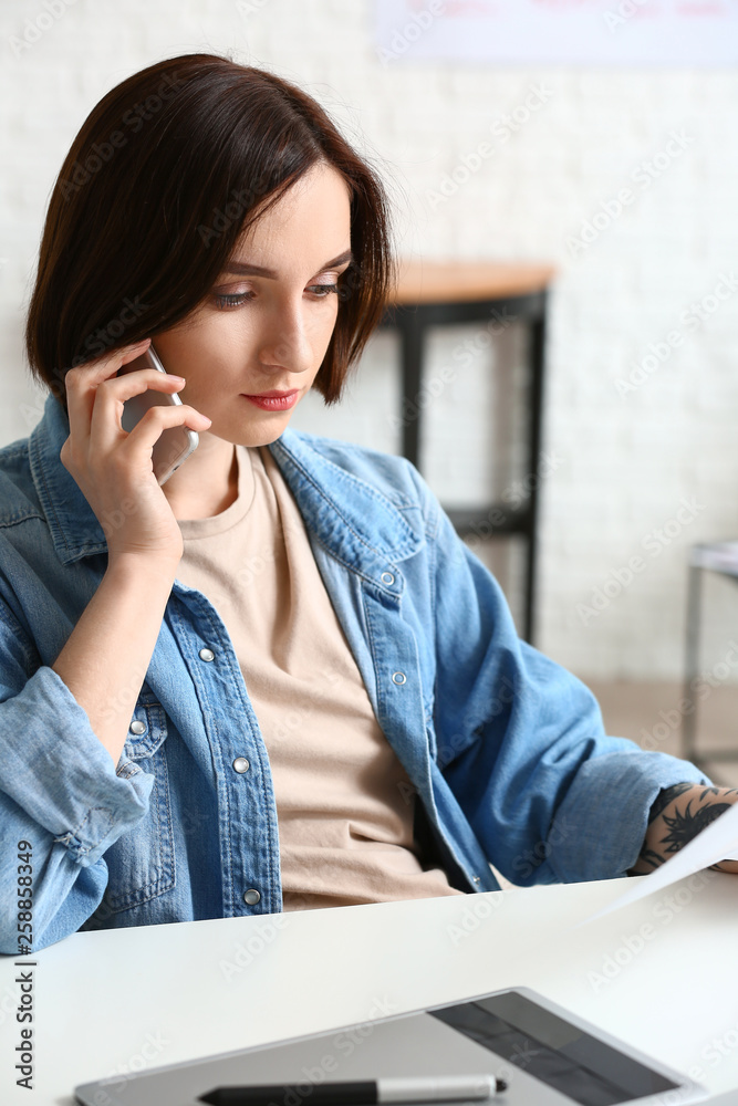 Female designer working in office