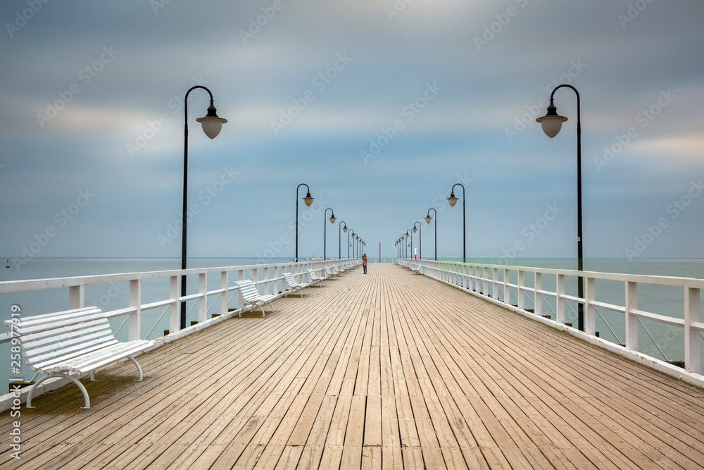 Wooden pier in Gdynia Orlowo at dawn, Poland