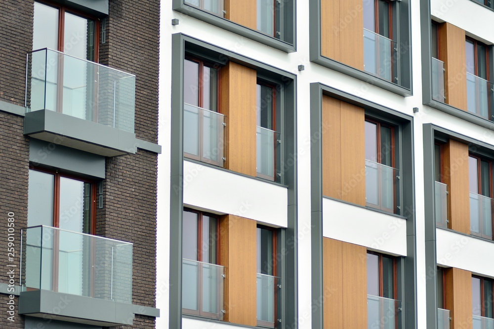 Fragment of a modern apartment building in front. Very modern apartment house.