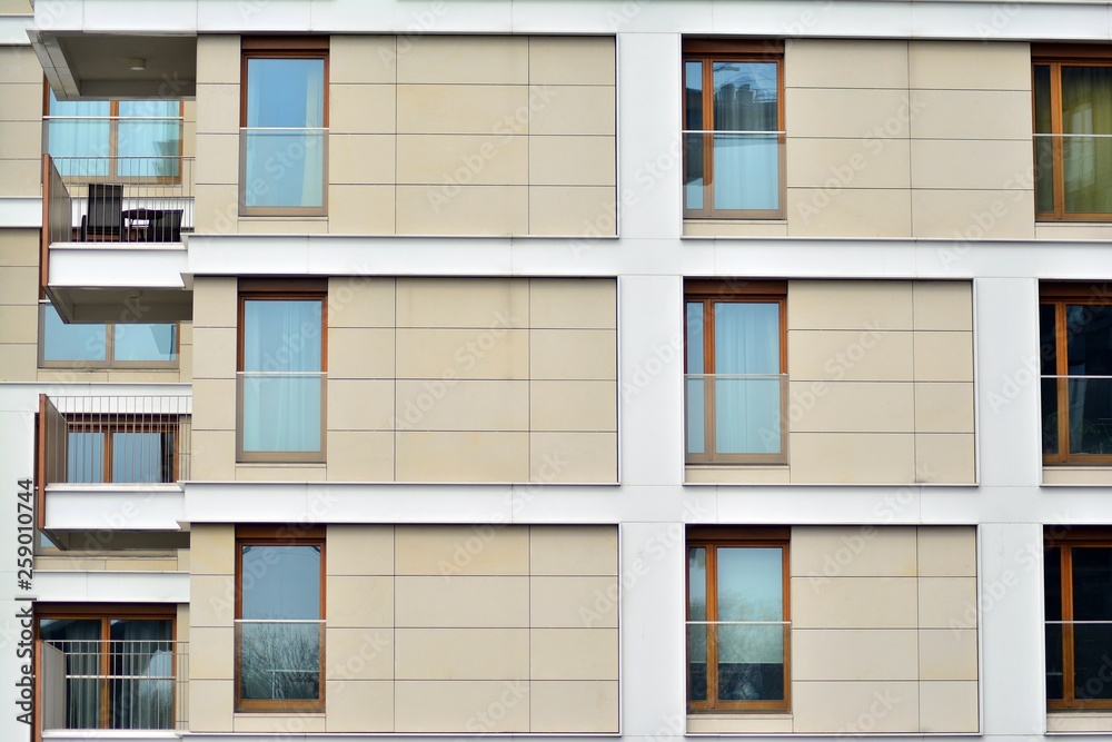 Fragment of a modern apartment building in front. Very modern apartment house.