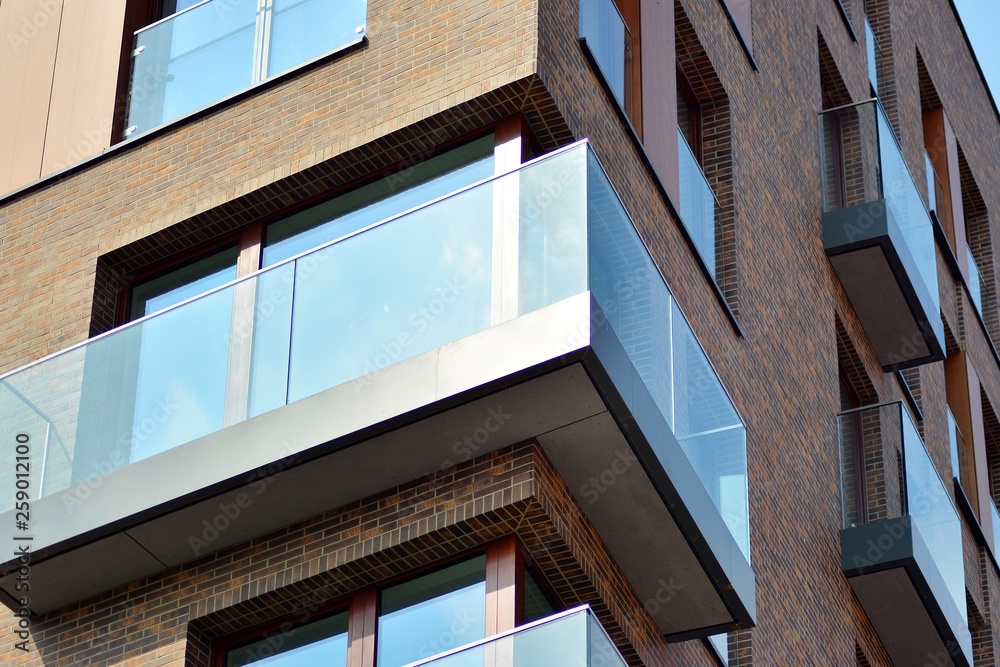 Fragment of a modern apartment building in front. Very modern apartment house.