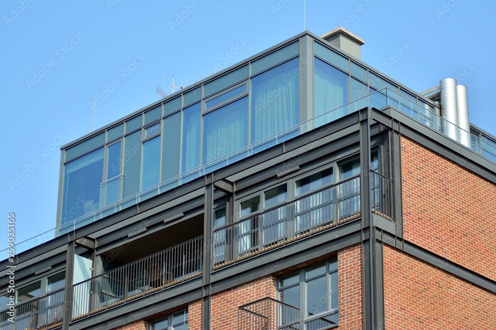 Fragment of a modern apartment building in front. Very modern apartment house.