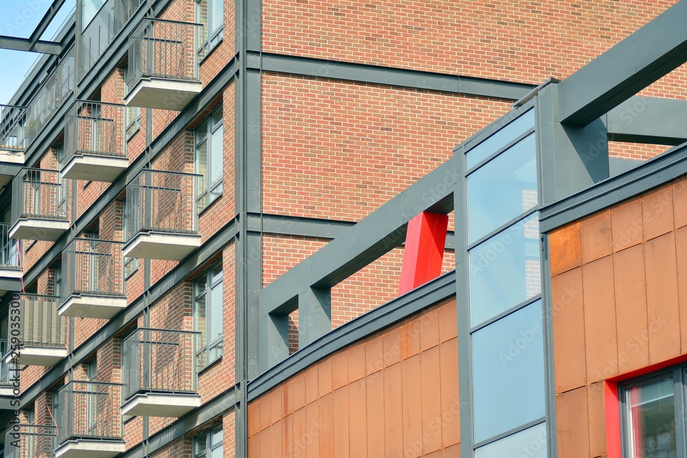 Fragment of a modern apartment building in front. Very modern apartment house.