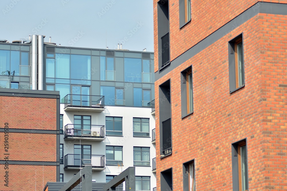 Fragment of a modern apartment building in front. Very modern apartment house.