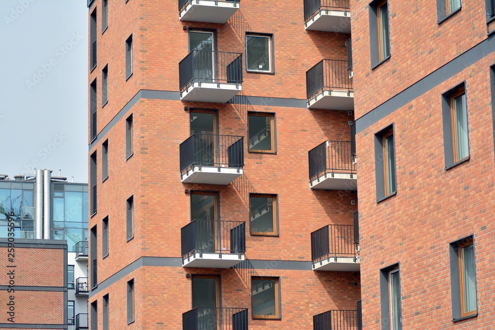 Fragment of a modern apartment building in front. Very modern apartment house.