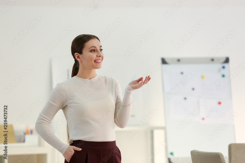 Stylish businesswoman in office