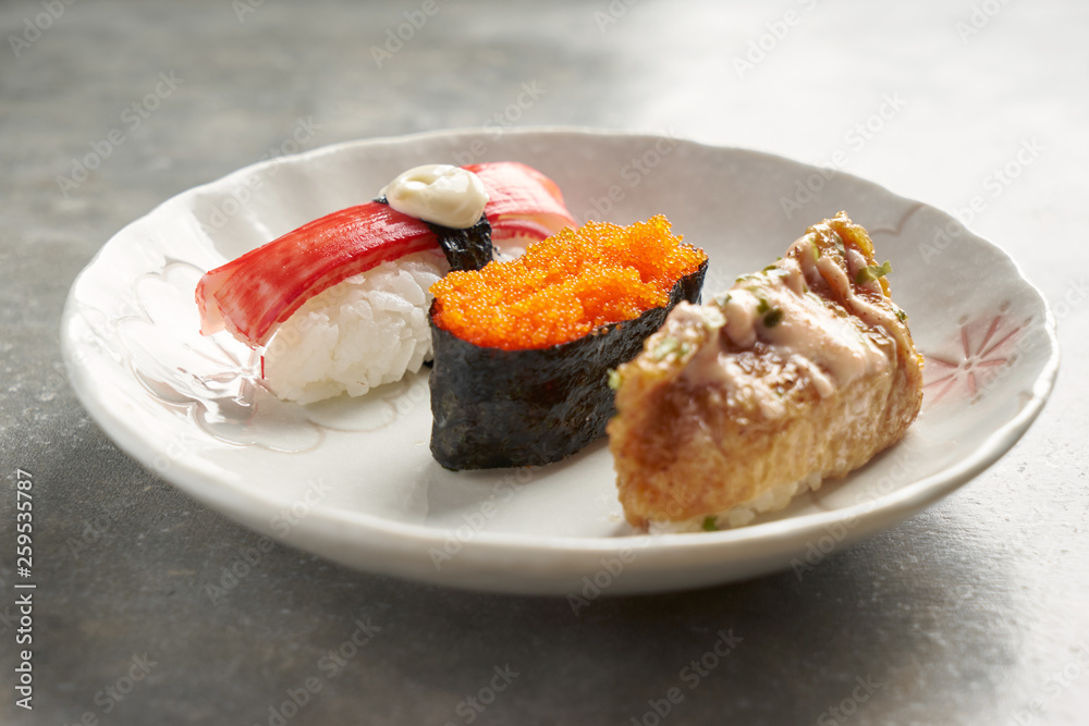 Close up of Japanese sushi set on white plate