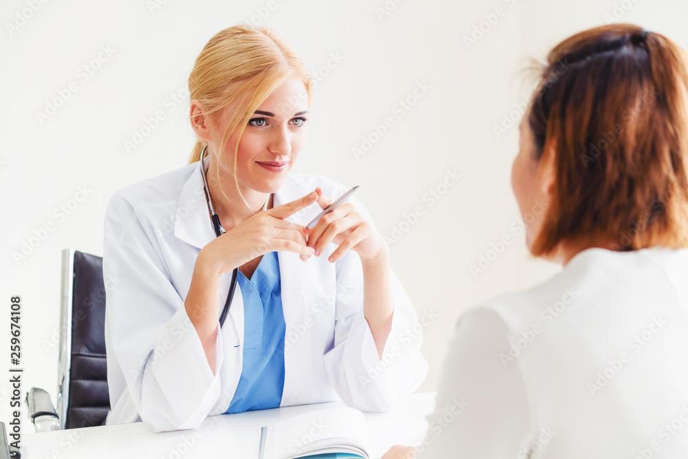 Female patient visits woman doctor or gynecologist during gynaecology check up in office at the hosp