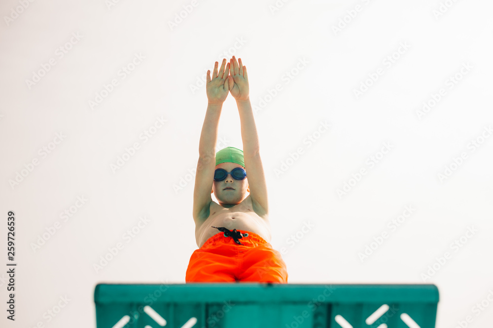 Boy preparing to dive