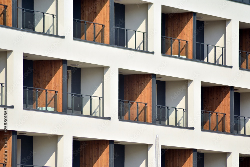 European modern residential architecture. Fragment of a modern apartment building in front. Very mod