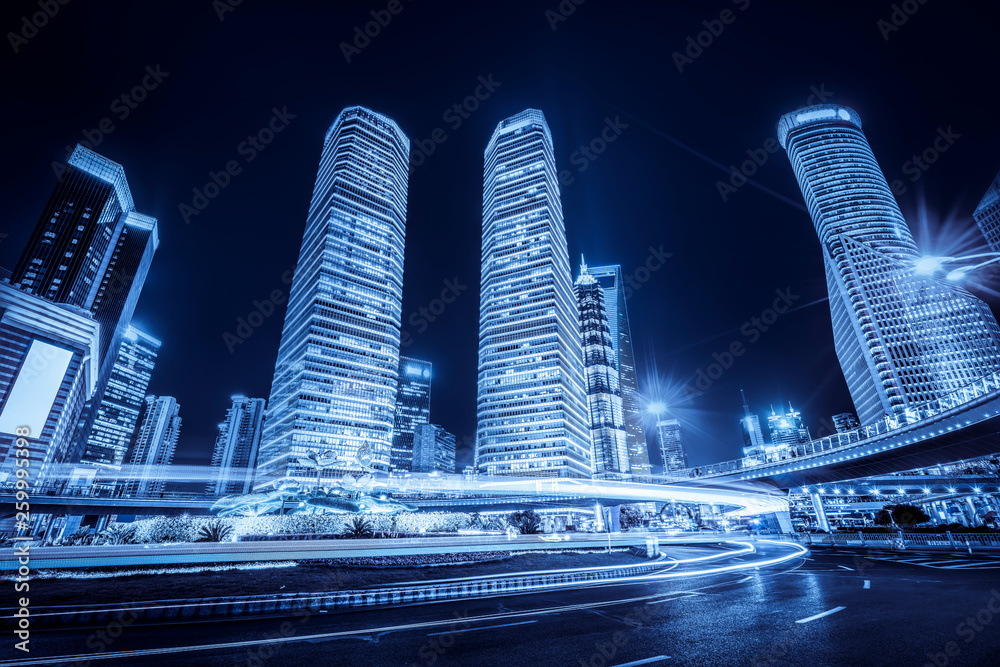 Urban Nightscape Architecture Street and Fuzzy Car Lights..