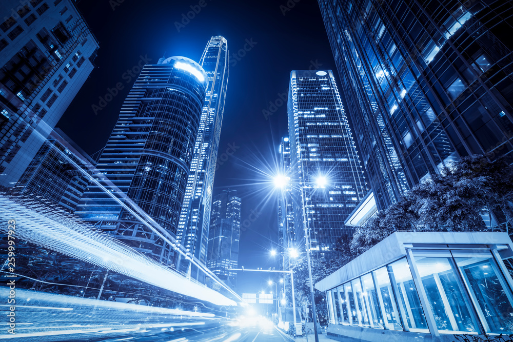 Urban Nightscape Architecture Street and Fuzzy Car Lights..