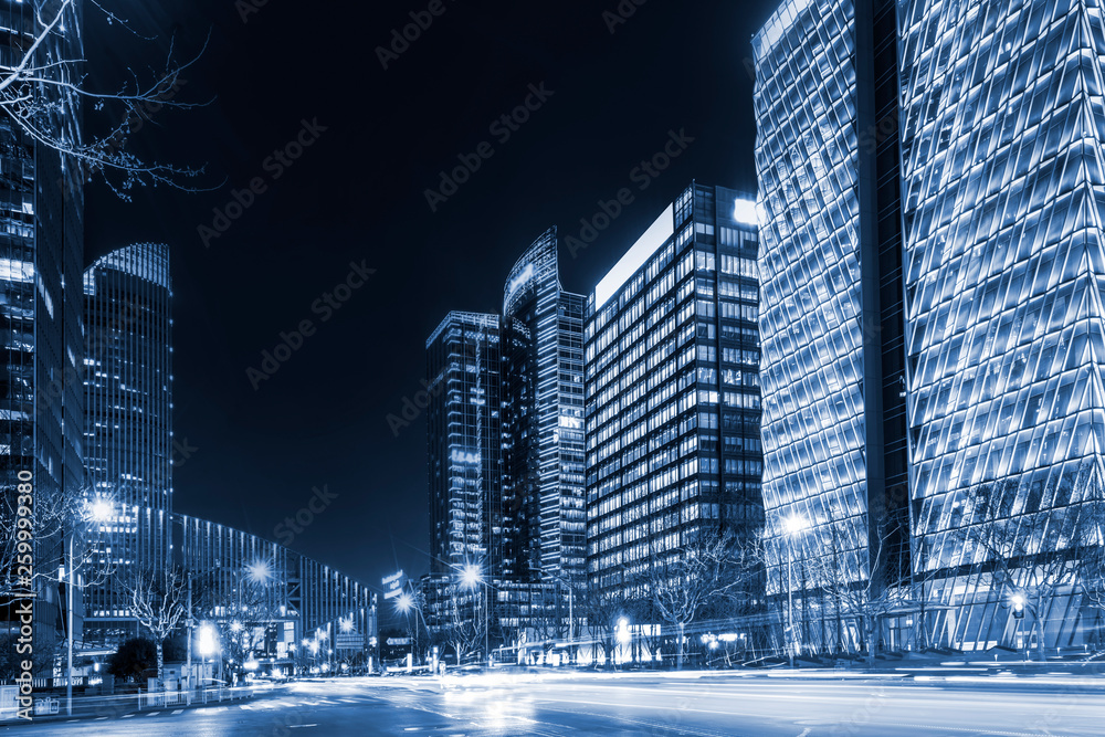 Urban Nightscape Architecture Street and Fuzzy Car Lights..