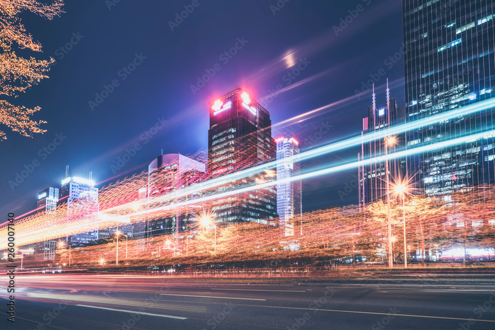 Urban Nightscape Architecture Street and Fuzzy Car Lights..