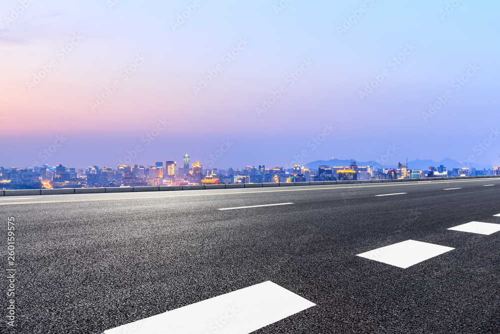 Asphalt highway passing through the city above in Hangzhou at night